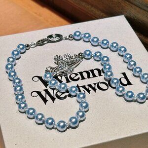 Vivienne Westwood Light Blue Pearl Bracelet Silver Tone Crystal Saturn Pendant